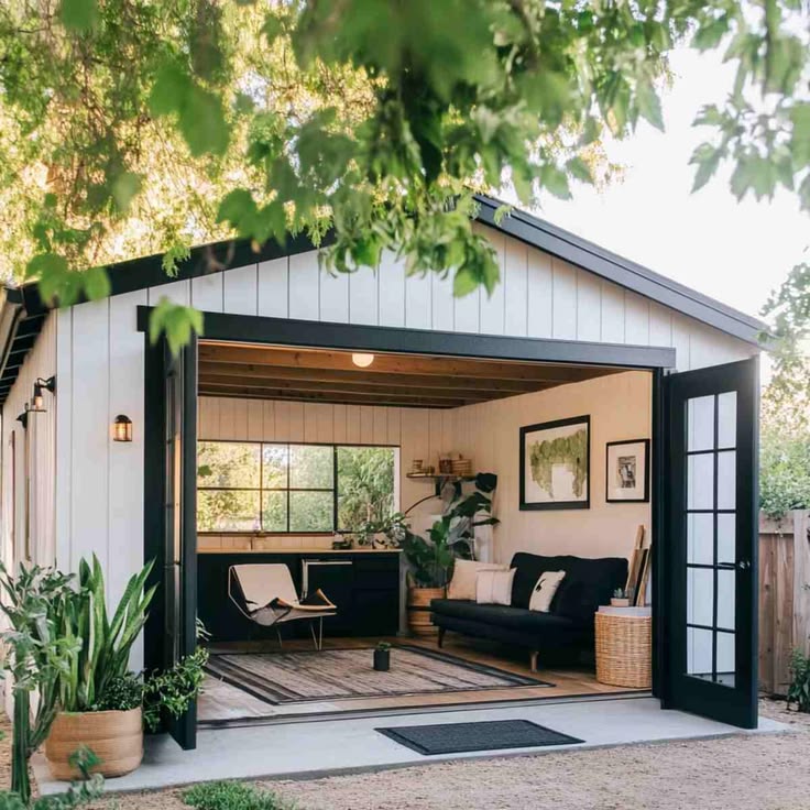 Converted garage into a lounge room. white with black doors