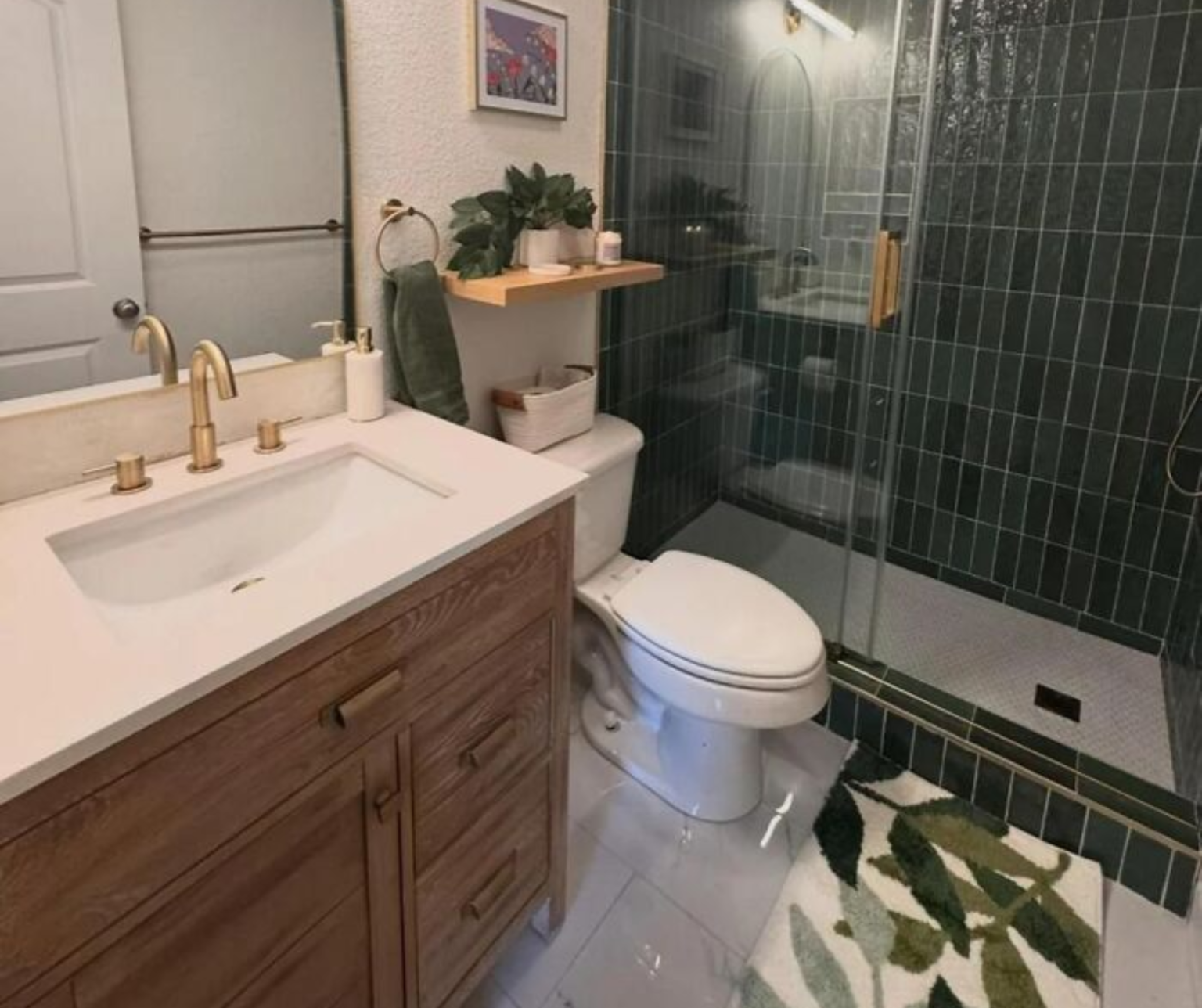 Luxury bathroom renovation with a modern freestanding bath, walk in shower and stone vanity.